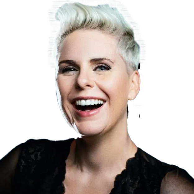 A woman with white hair smiling and wearing a black top.