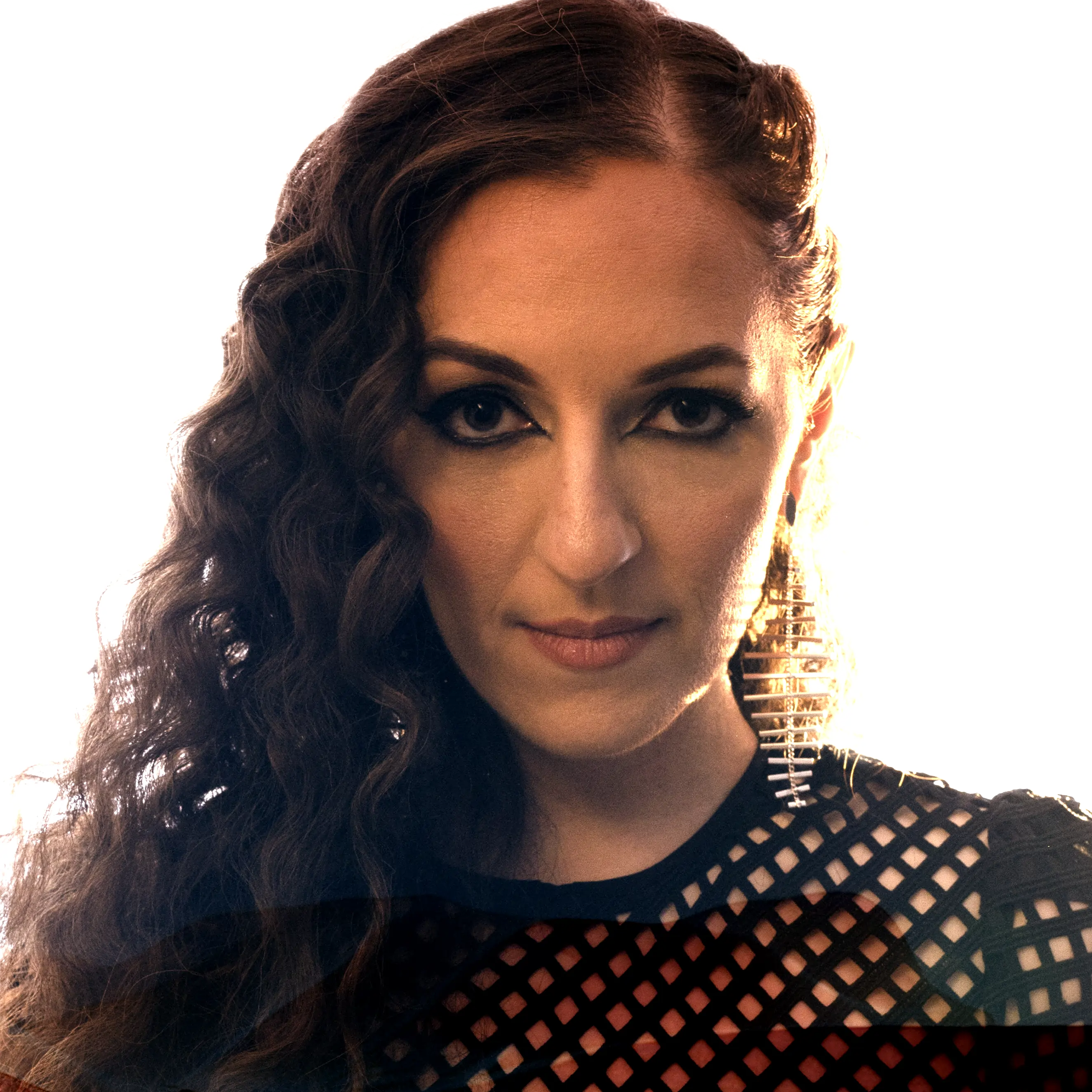 A close up of a person with long hair.